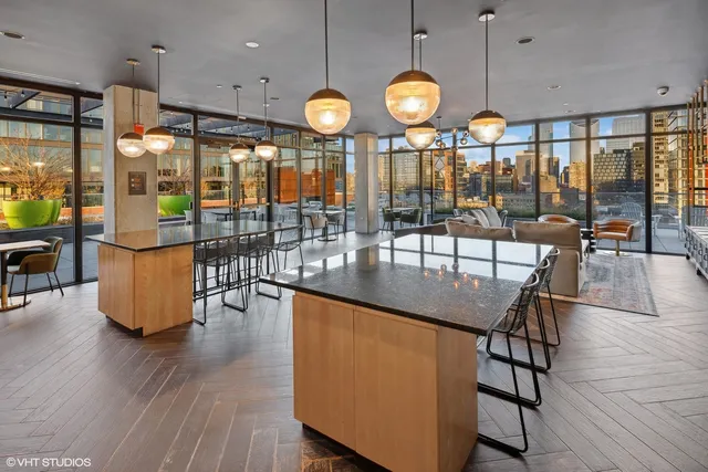 an open kitchen with a table and chairs in it