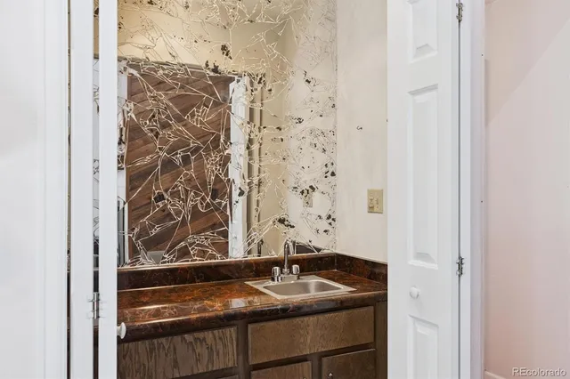a sink and a granite top door