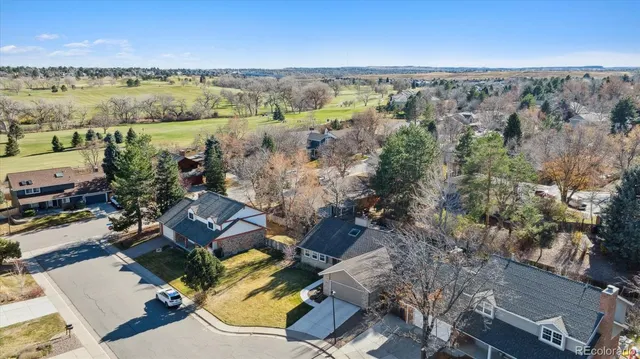 an aerial view of residential house with outdoor space and river