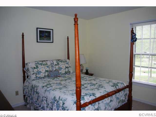 11121 Alanthus Road Midlothian, VA 23112 - Photo 6 of 12 a view of a bedroom