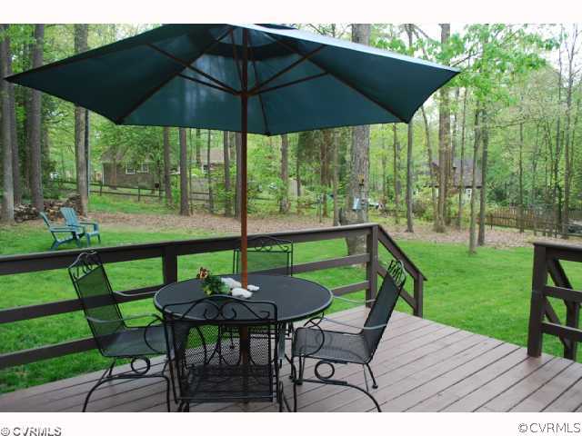 11121 Alanthus Road Midlothian, VA 23112 - Photo 8 of 12 a view of an outdoor sitting area with furniture and backyard