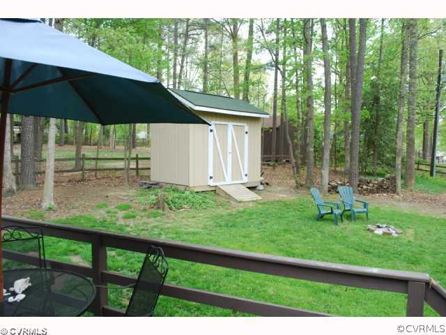 11121 Alanthus Road Midlothian, VA 23112 - Photo 9 of 12 a view of backyard with green space