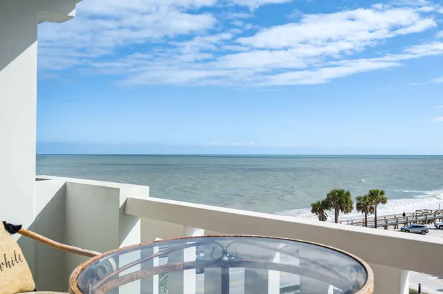 a view of roof with seating space