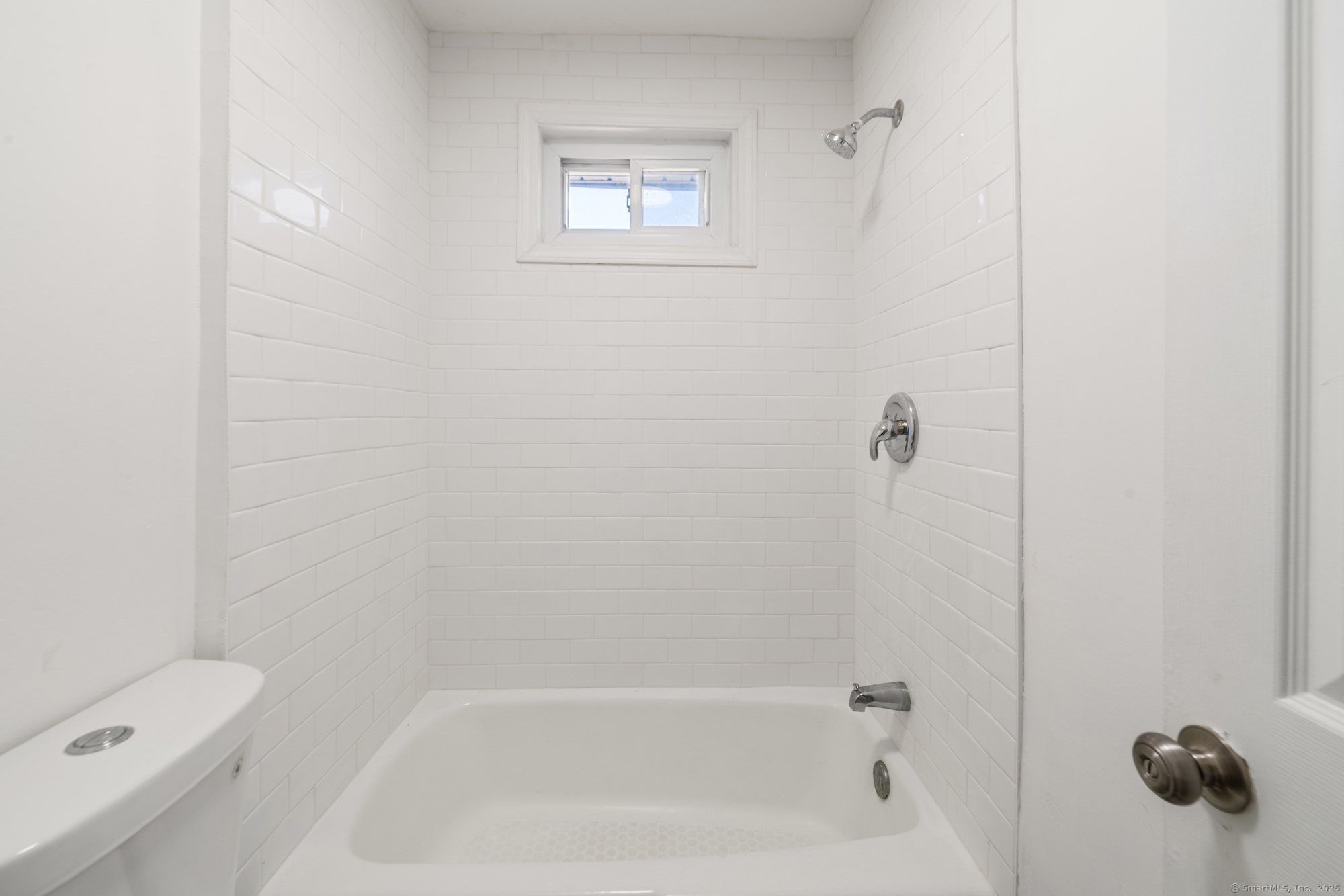 23 Salem Street Naugatuck, CT 06770 - Photo 16 of 40 a close up of a bathtub curtain