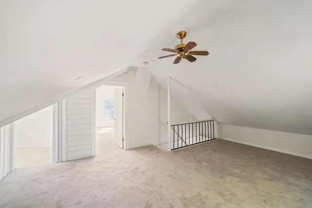 a view of a livingroom with a ceiling fan