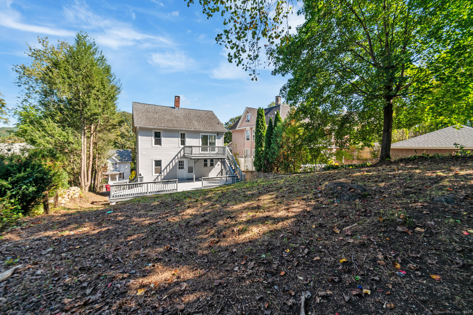 23 Salem Street Naugatuck, CT 06770 - Photo 32 of 40 a view of a house with a yard