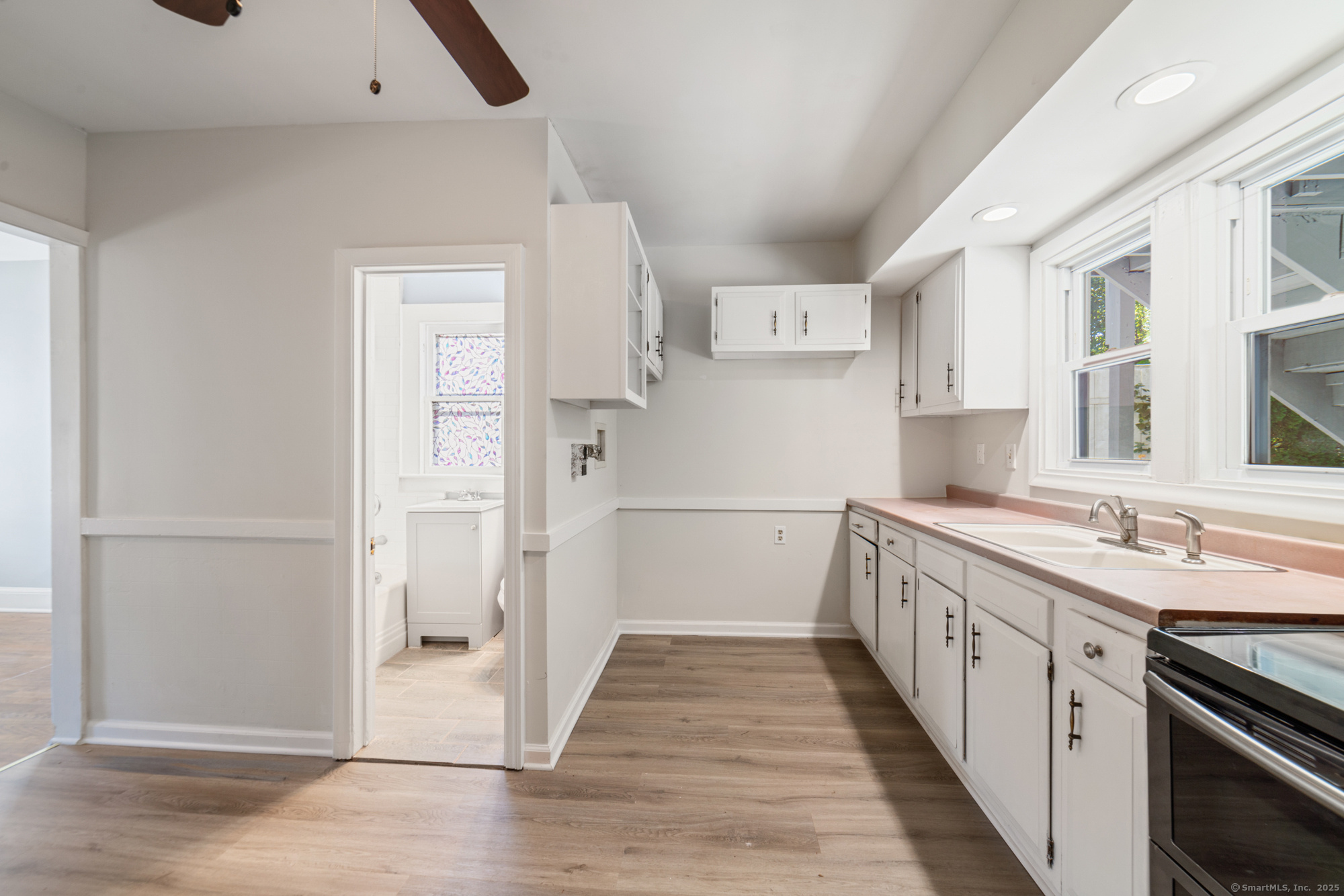 23 Salem Street Naugatuck, CT 06770 - Photo 7 of 40 a kitchen with stainless steel appliances granite countertop a refrigerator and a stove