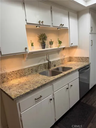 a kitchen with a stove and a microwave