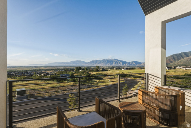 923 North Emery Lane Elk Ridge, UT 84651 - Photo 89 of 101 Spacious outdoor balcony with a light-colored aggregate surface