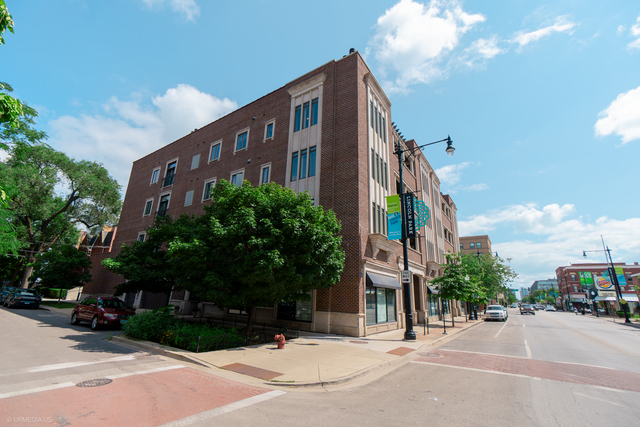 a view of a building along the street