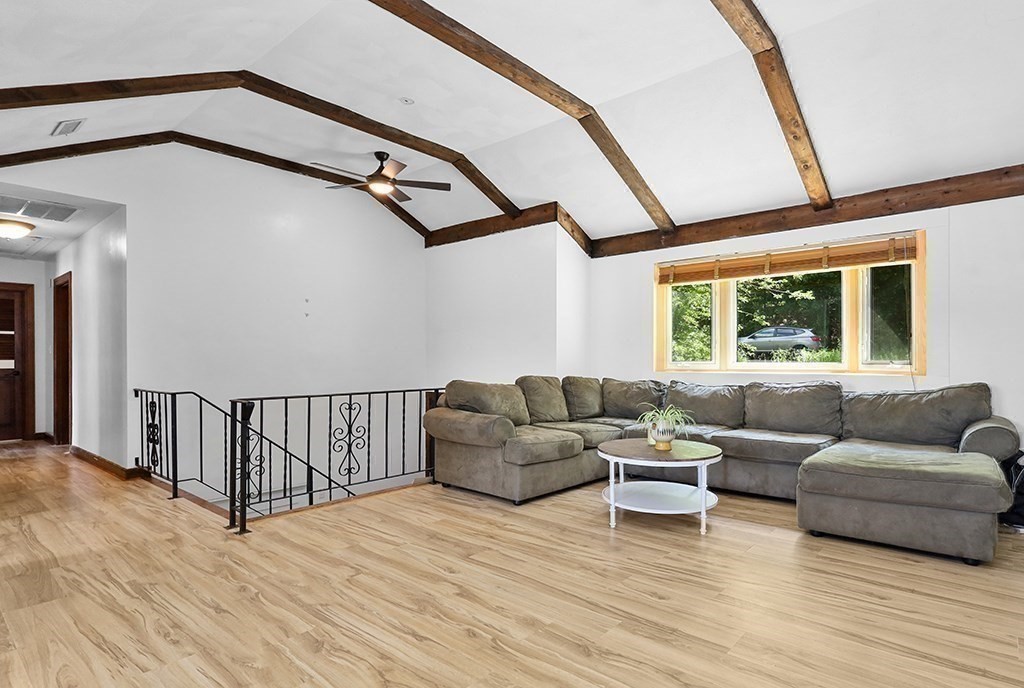 163 Walnut Road Wrentham, MA 02093 - Photo 11 of 39 a living room with furniture and a window