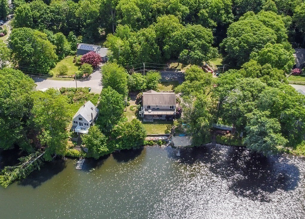 163 Walnut Road Wrentham, MA 02093 - Photo 21 of 39 a backyard of a house with a yard and outdoor seating