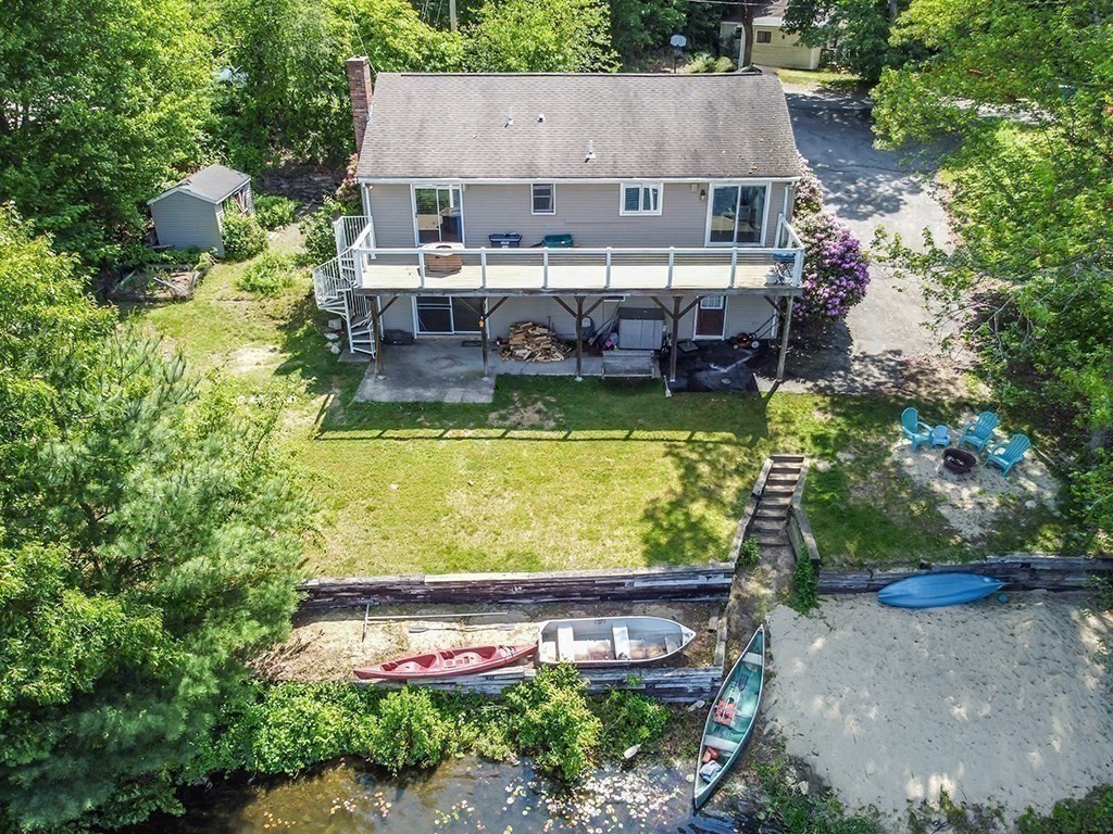 163 Walnut Road Wrentham, MA 02093 - Photo 22 of 39 an aerial view of a house with swimming pool garden and patio