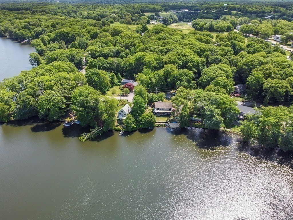 163 Walnut Road Wrentham, MA 02093 - Photo 36 of 39 a backyard of a house with a yard and outdoor seating