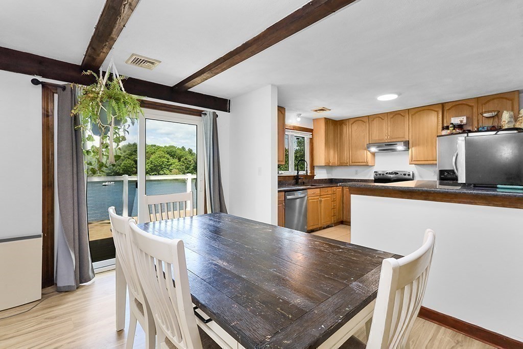 163 Walnut Road Wrentham, MA 02093 - Photo 5 of 39 a kitchen with kitchen island a large counter top space and stainless steel appliances