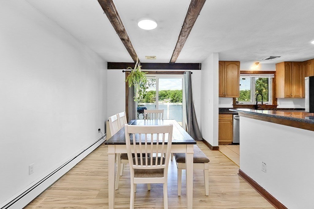 163 Walnut Road Wrentham, MA 02093 - Photo 7 of 39 a kitchen with stainless steel appliances granite countertop a stove a sink and a refrigerator