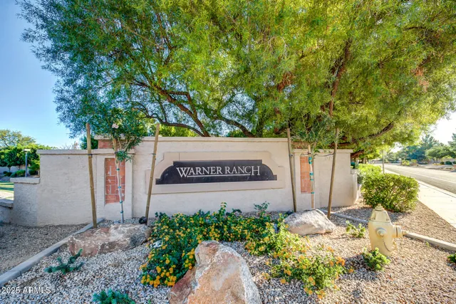 a sign on the side of the road