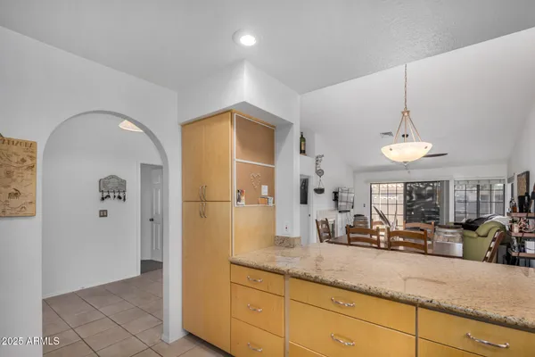 a kitchen with sink and window