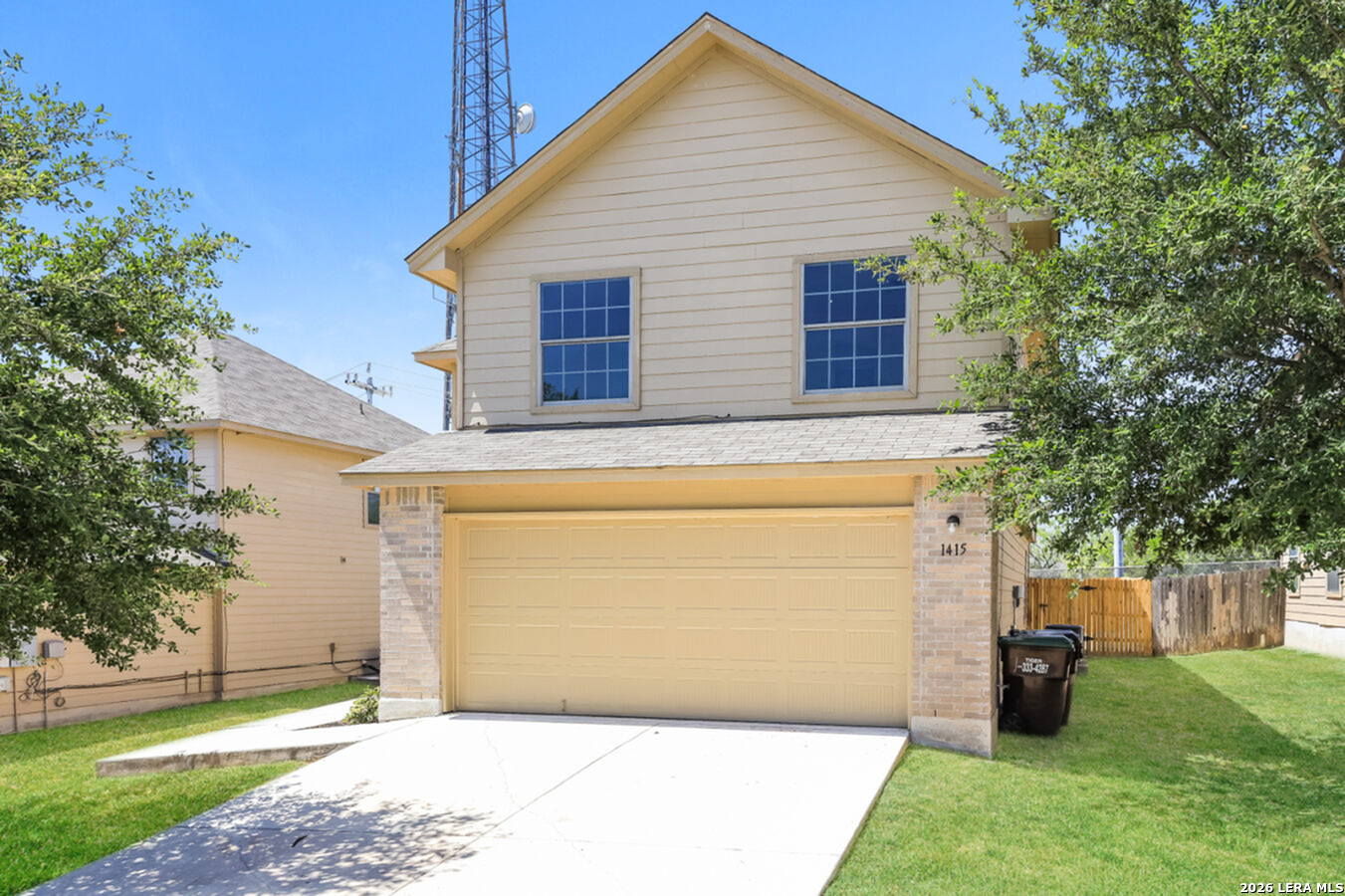 a view of a house with a back yard