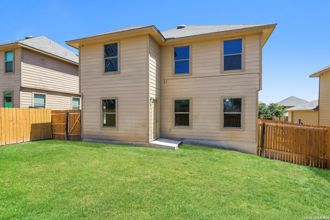 1415 Durango Run San Antonio, TX 78245 - Photo 2 of 14 a view of backyard with barbeque grill and a yard