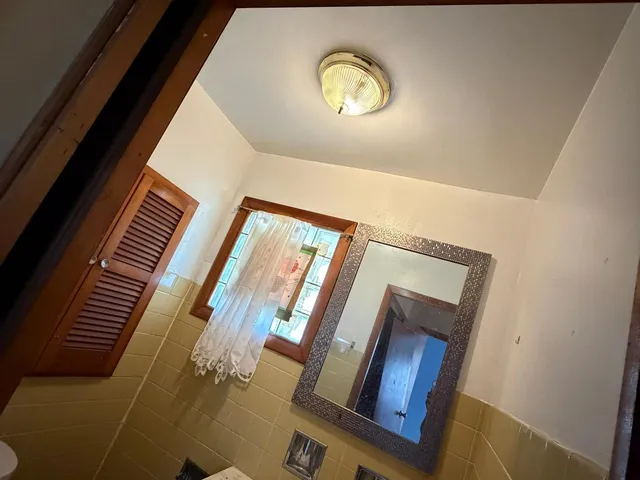 a view of staircase with wooden floor