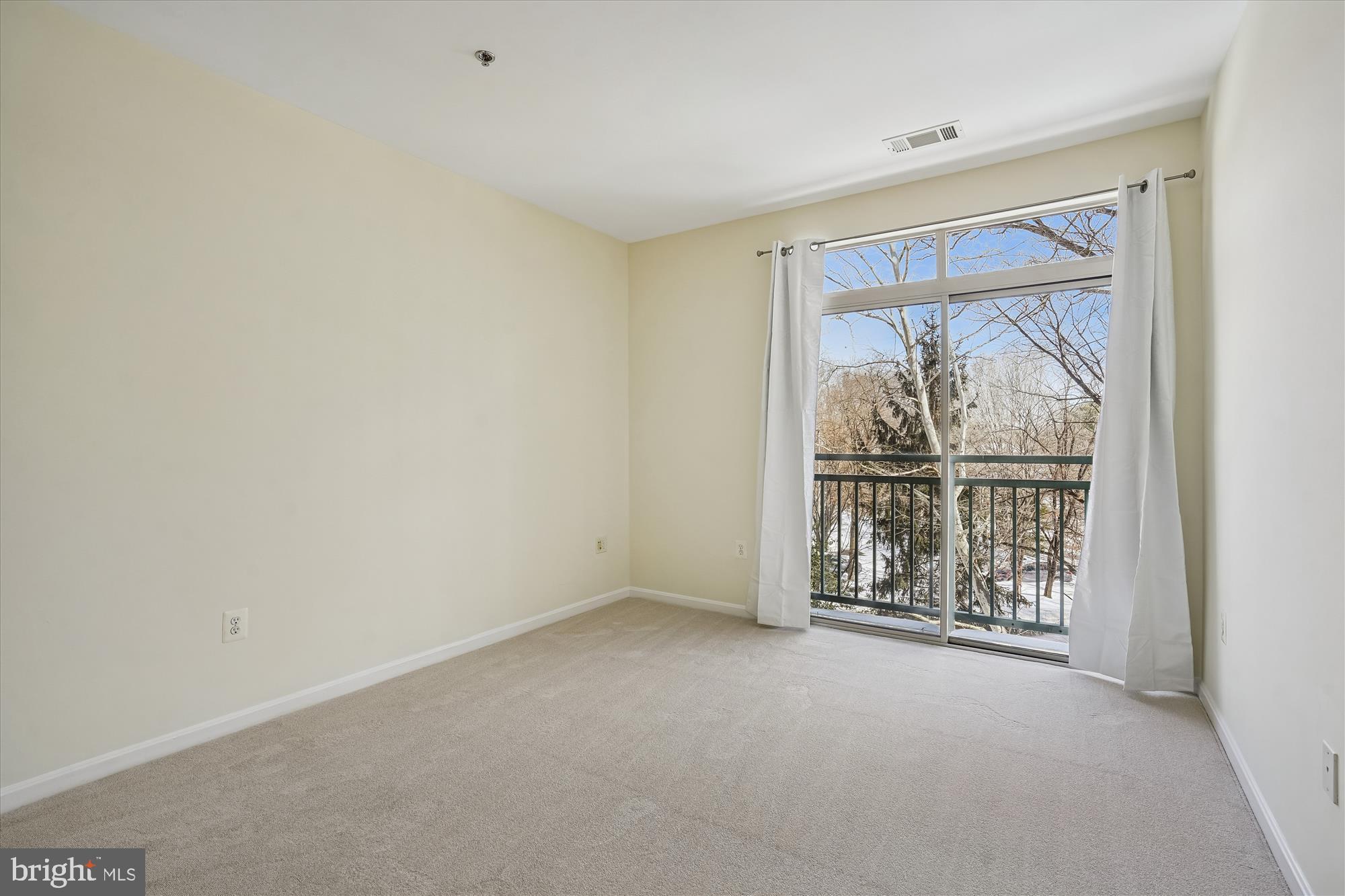 1851 Stratford Park Place, Unit 304 Reston, VA 20190 - Photo 19 of 38 Bedroom #2 with new carpet.