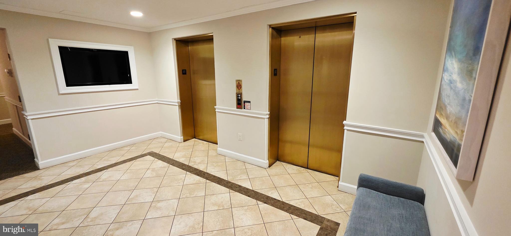 1851 Stratford Park Place, Unit 304 Reston, VA 20190 - Photo 23 of 38 Elevator building.