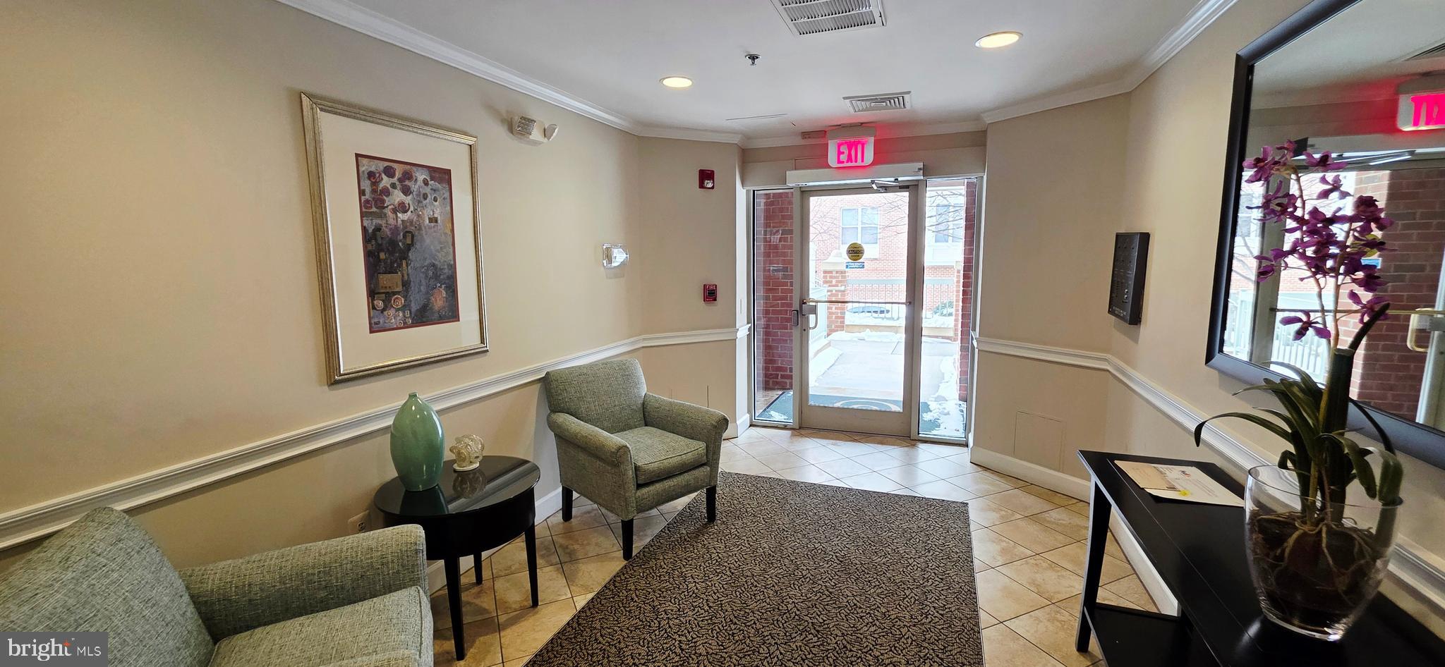 1851 Stratford Park Place, Unit 304 Reston, VA 20190 - Photo 24 of 38 Building lobby.