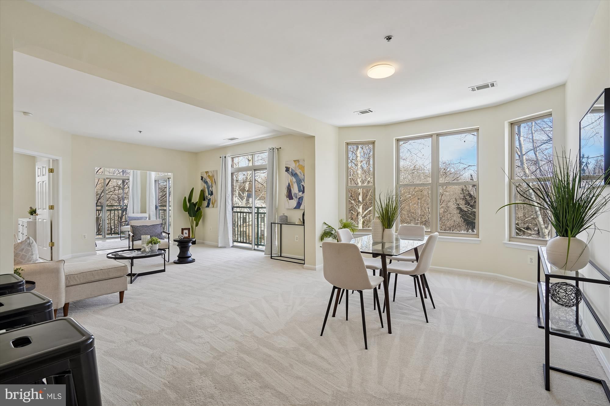 1851 Stratford Park Place, Unit 304 Reston, VA 20190 - Photo 5 of 38 Brand new carpet in living area and bedrooms.