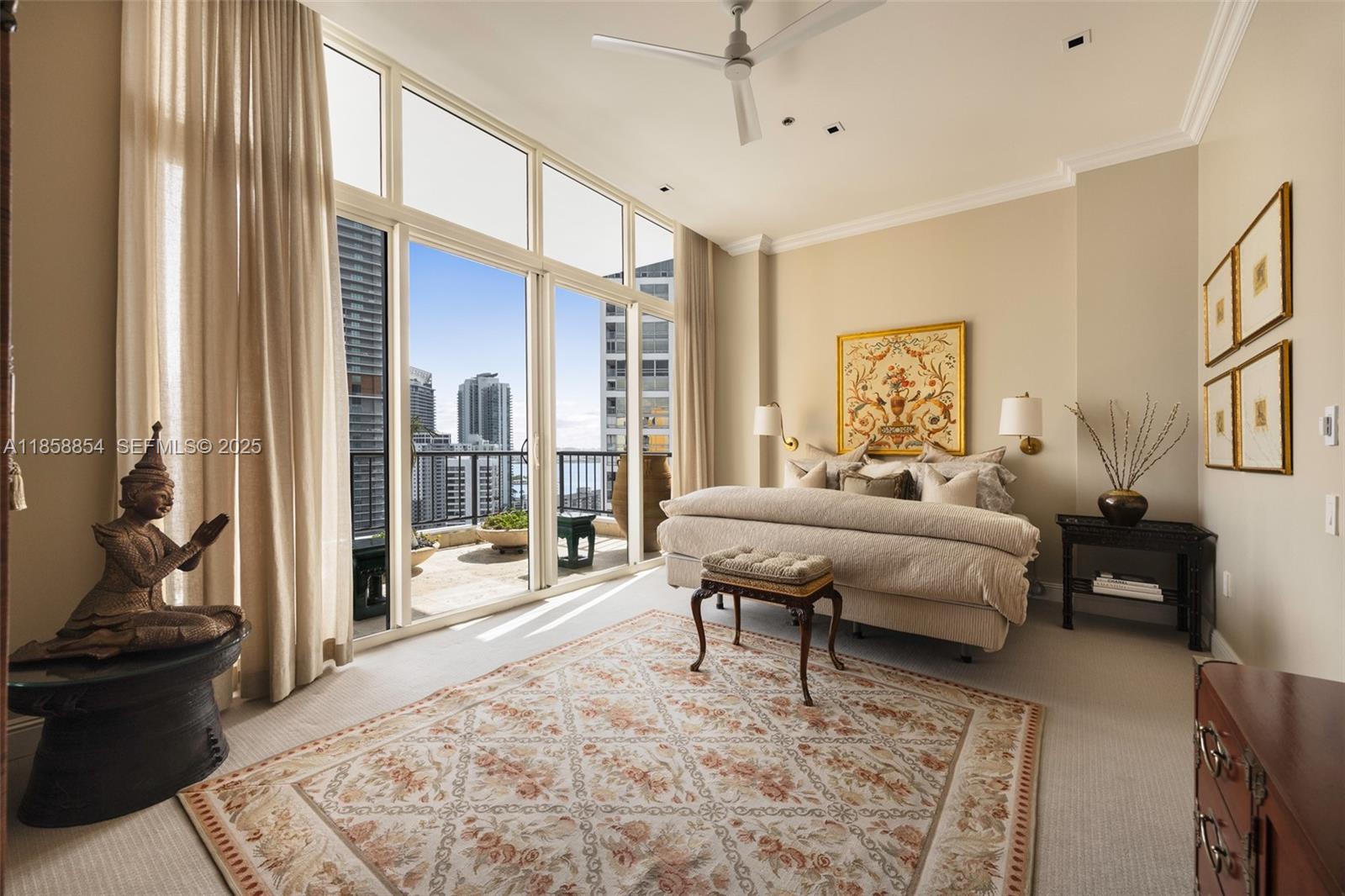 1581 Brickell Avenue, Unit T104 Miami, FL 33129 - Photo 16 of 42 a bedroom with a large bed and a large window