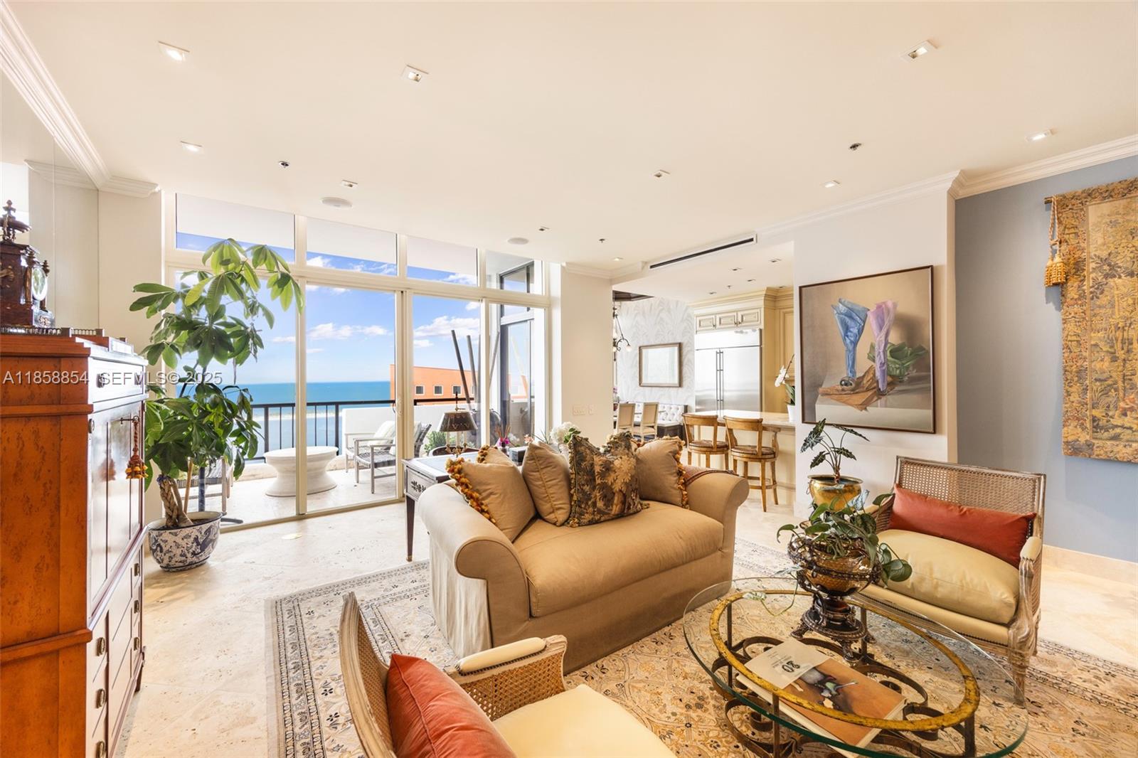 1581 Brickell Avenue, Unit T104 Miami, FL 33129 - Photo 8 of 42 a living room with furniture and a large window