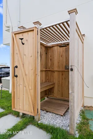 a view of front door and small yard