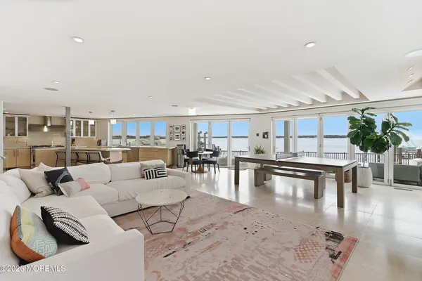 a living room with furniture and a table