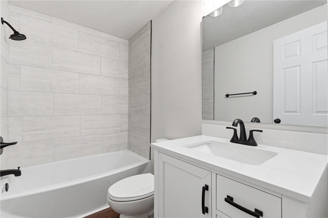 1353 Foust Road Xenia, OH 45385 - Photo 45 of 50 This clean and bright bathroom features contemporary fixtures and ample lighting.