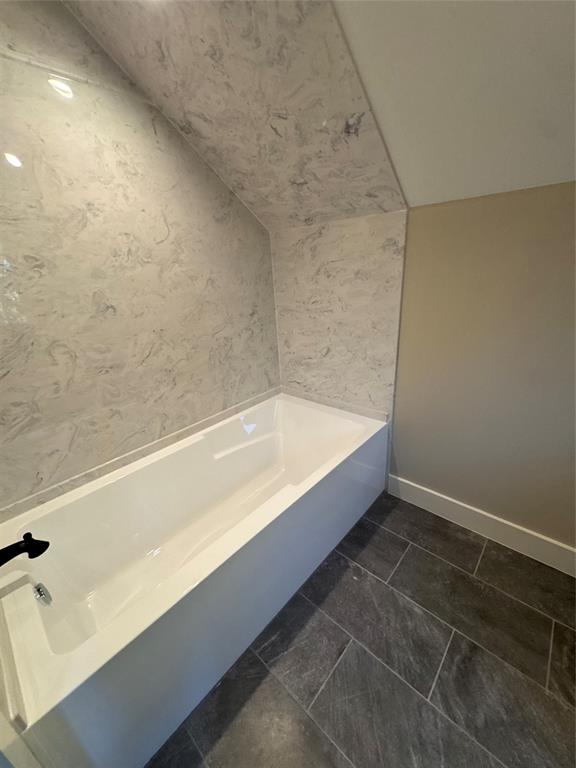 2340 Ft Graham Road Elm Mott, TX 76640 - Photo 20 of 24 a spacious bathroom with a bathtub and shower