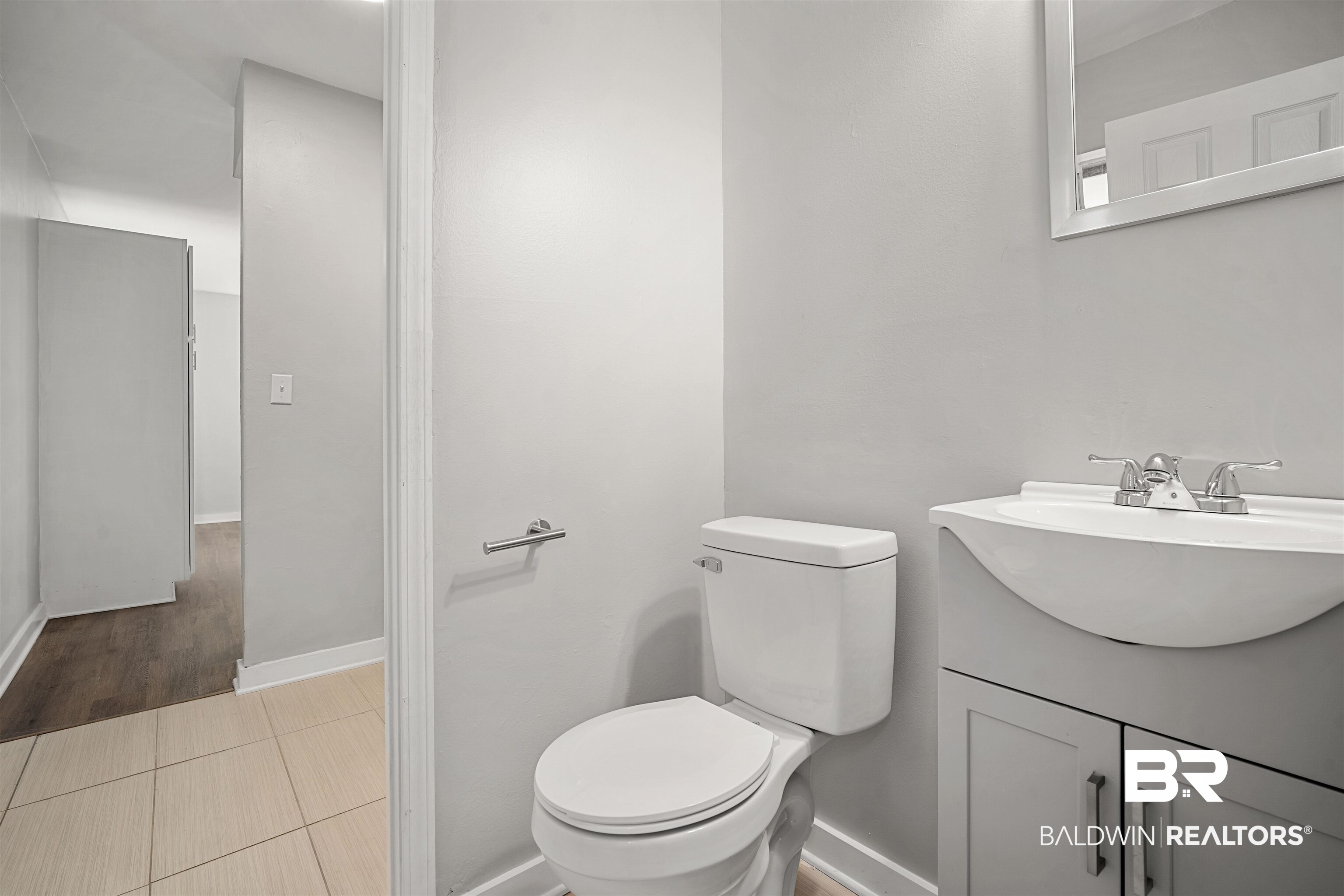 1368 Hubert Pierce Road Mobile, AL 36608 - Photo 15 of 25 Bathroom featuring vanity and light tile patterned floors