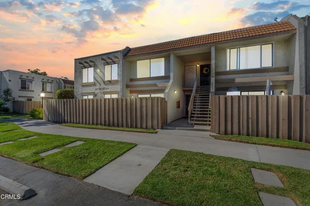 a front view of a house having yard