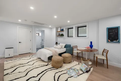 a bedroom with furniture and a bed