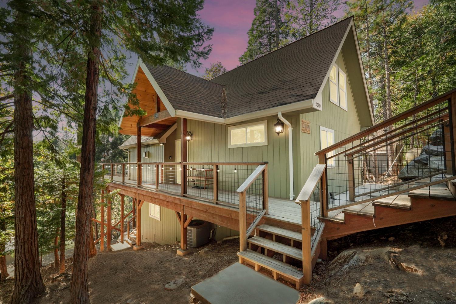 20819 Muheli Road Mi Wuk Village, CA 95346 - Photo 1 of 49 a view of patio with a table and chairs