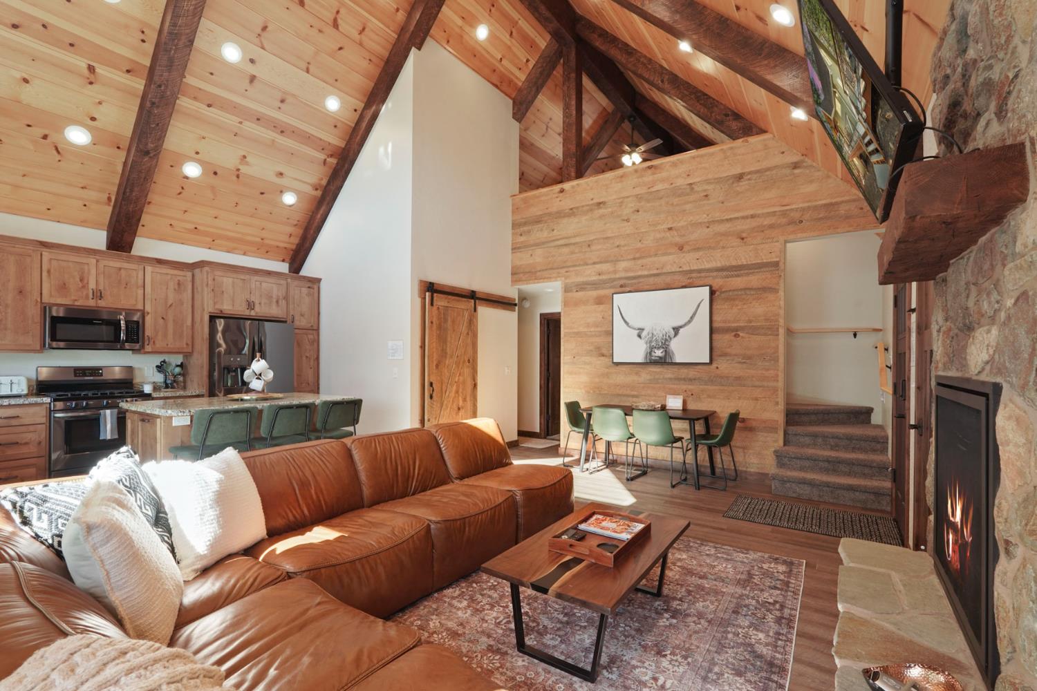 20819 Muheli Road Mi Wuk Village, CA 95346 - Photo 20 of 49 a living room with furniture and kitchen view