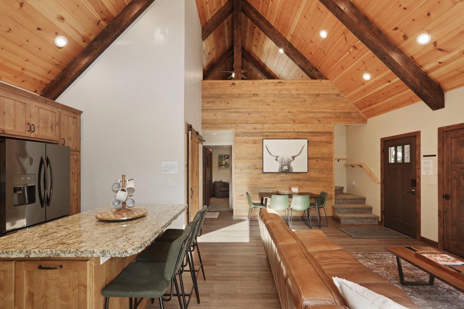 20819 Muheli Road Mi Wuk Village, CA 95346 - Photo 25 of 49 a dining room with furniture and wooden floor