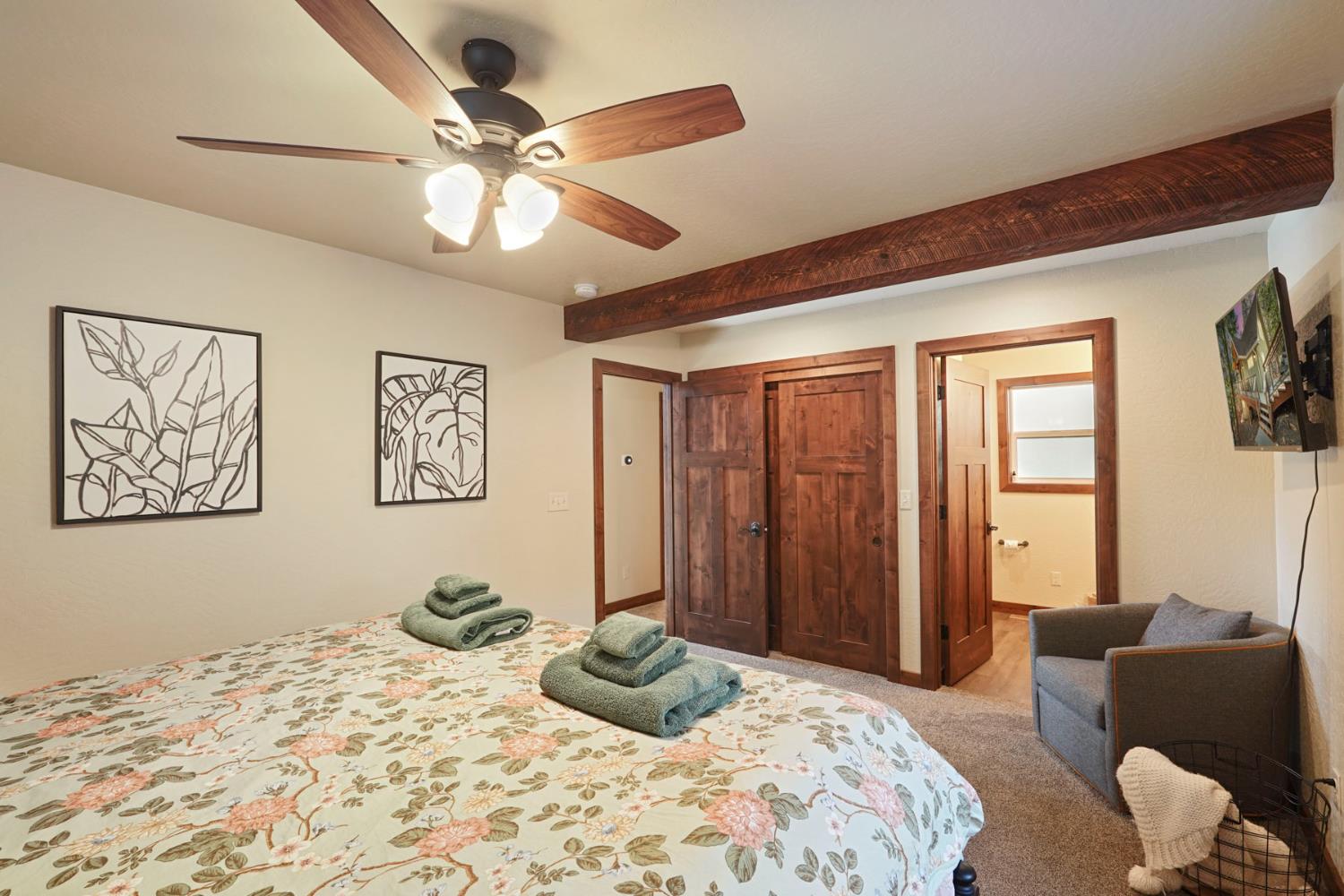 20819 Muheli Road Mi Wuk Village, CA 95346 - Photo 29 of 49 a bedroom with a large bed and a window