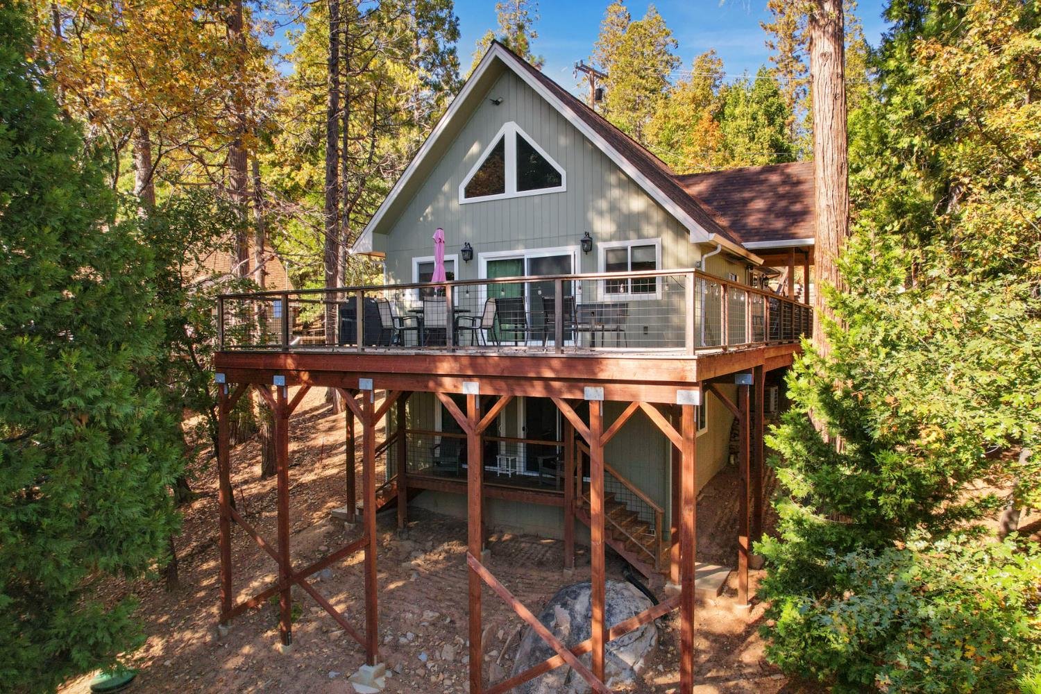 20819 Muheli Road Mi Wuk Village, CA 95346 - Photo 3 of 49 a house view with a outdoor space