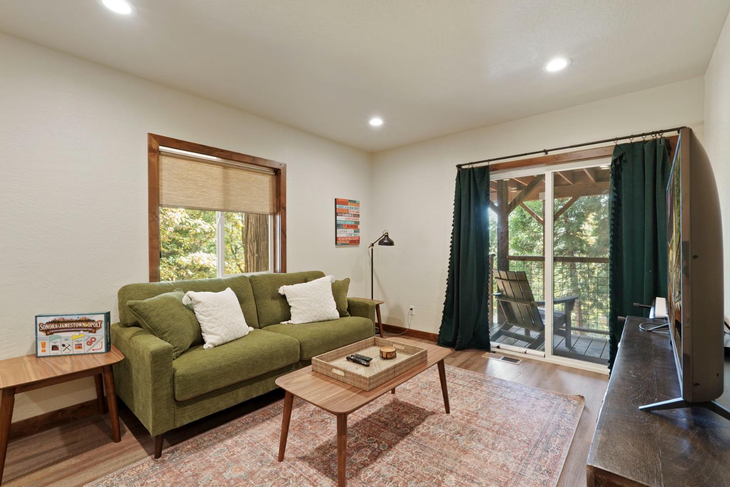20819 Muheli Road Mi Wuk Village, CA 95346 - Photo 37 of 49 a living room with furniture and a window