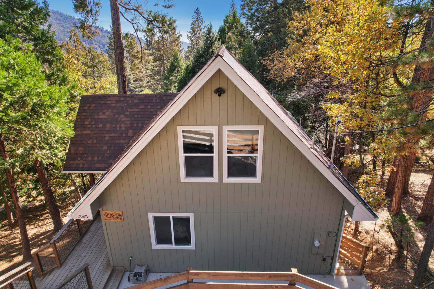 20819 Muheli Road Mi Wuk Village, CA 95346 - Photo 8 of 49 a view of house with backyard