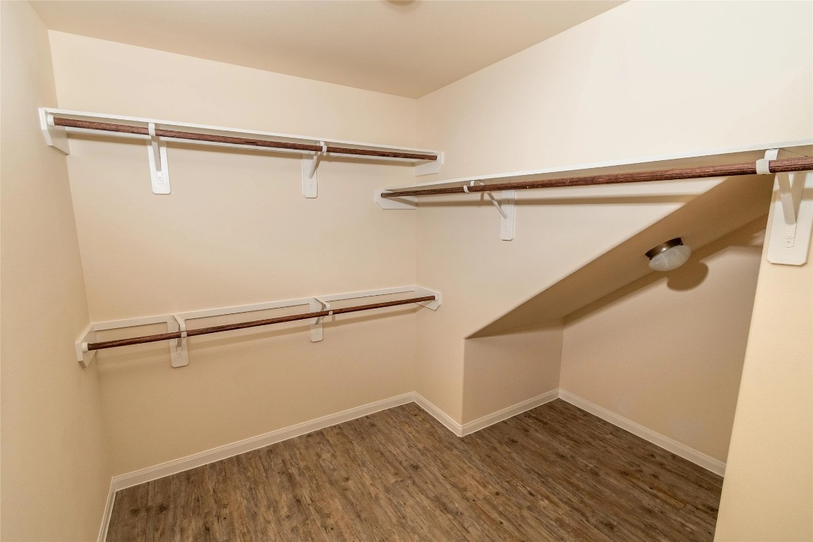 21155 Sprouse Circle Humble, TX 77338 - Photo 9 of 10 a view of an empty walk in closet