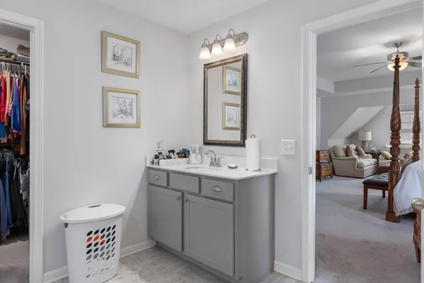 a view of bathroom with dual sinks