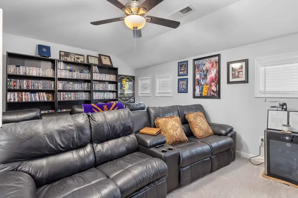 a living room with furniture and a couch