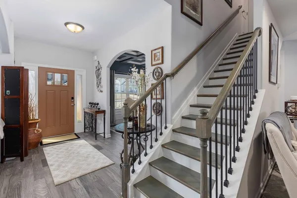a view of staircase with white walls and stairs