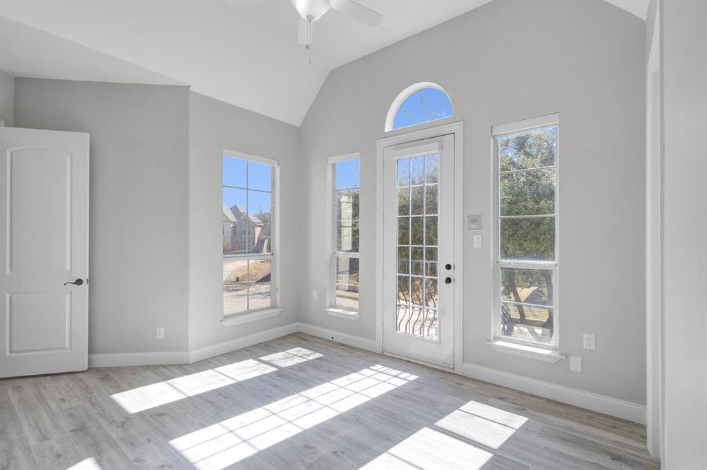 1004 Drake Drive Euless, TX 76039 - Photo 12 of 39 Private balcony with wrought iron railing overlooking scenic lake views.